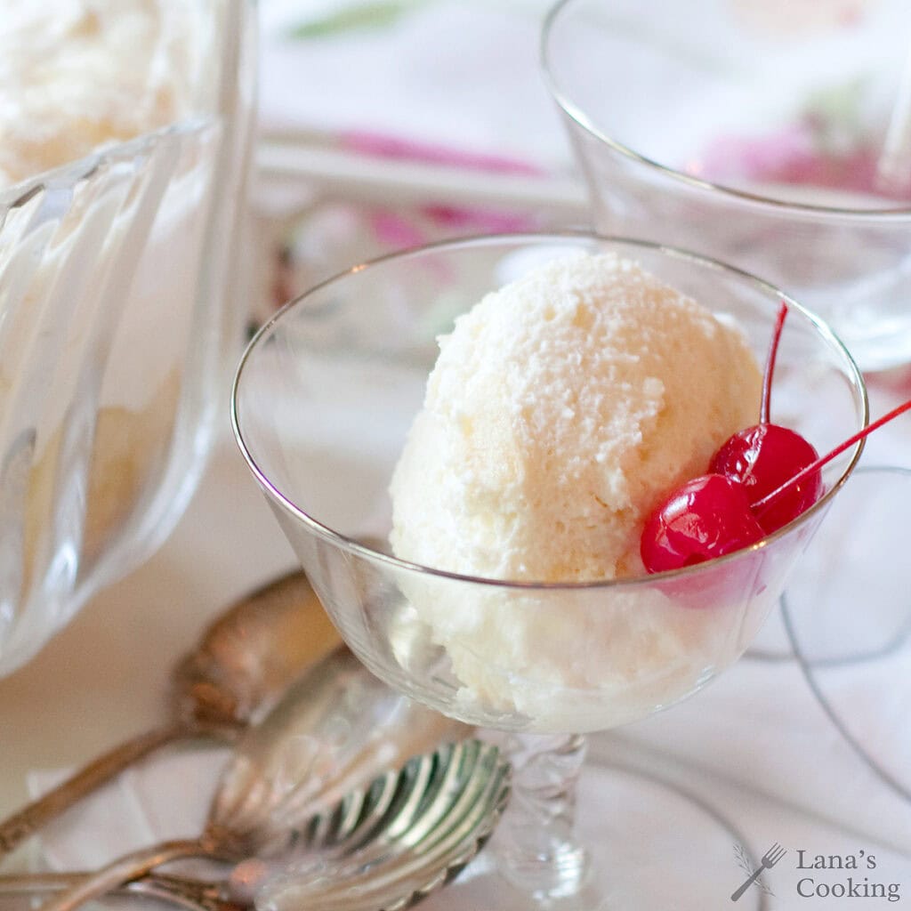 A serving of Charlotte Russe in a crystal dish.