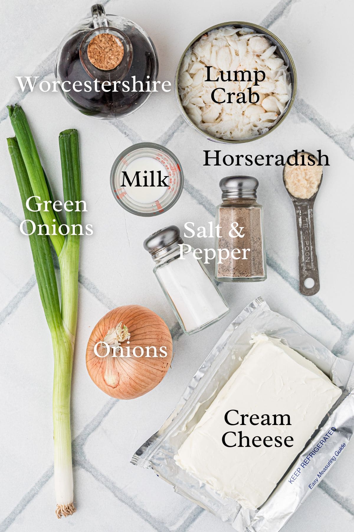 Ingredients for crab dip: green onions, onion, Worcestershire, crab, milk, horseradish, salt, pepper, cream cheese.
