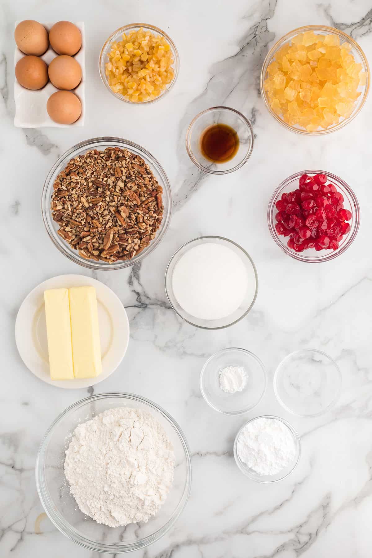 All the ingredients needed to make a light fruitcake.