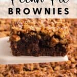 A close-up of a pecan pie brownie being lifted from a tray, topped with chopped pecans.