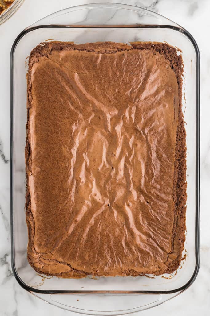 Cooked brownies in a baking dish.
