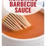 A brush dips into homemade barbecue sauce in a white bowl. Text: Homemade Barbecue Sauce.