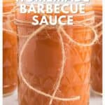 Glass jar filled with homemade barbecue sauce, tied with twine, with text promoting a BBQ recipe.