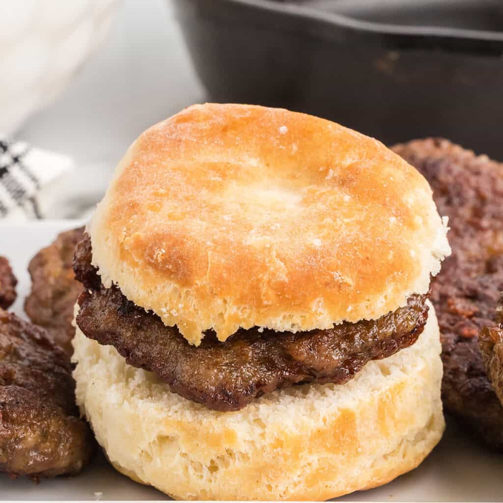 Buttermilk biscuit with a sausage patty inside.