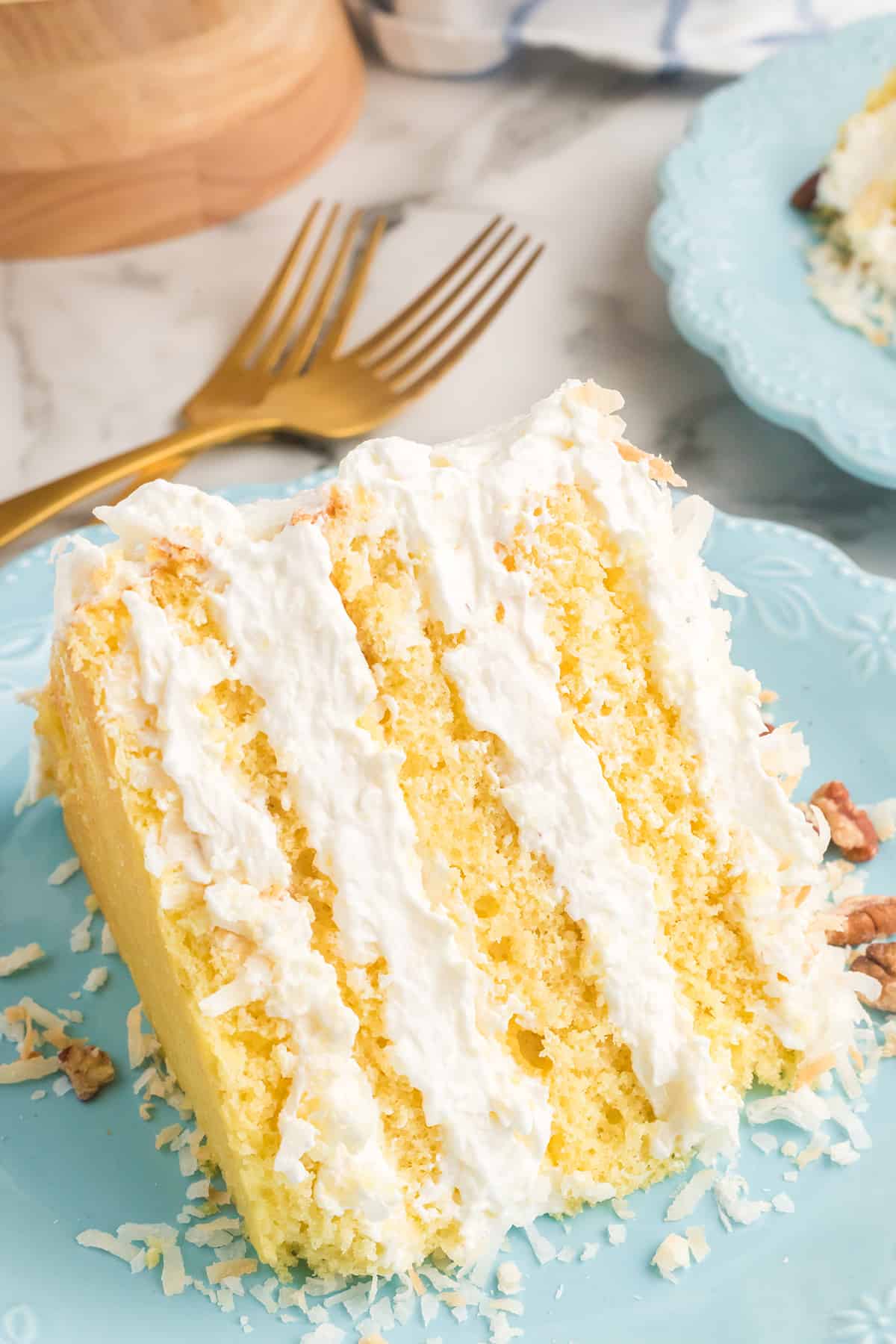A slice of cake on a blue serving plate.