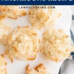 Coconut macaroons arranged on a white plate with a text overlay reading Coconut Macaroons Recipe.