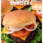 Close-up of cheeseburgers with lettuce, tomato, onion, and cheese on buns, with Homestyle Burgers text.