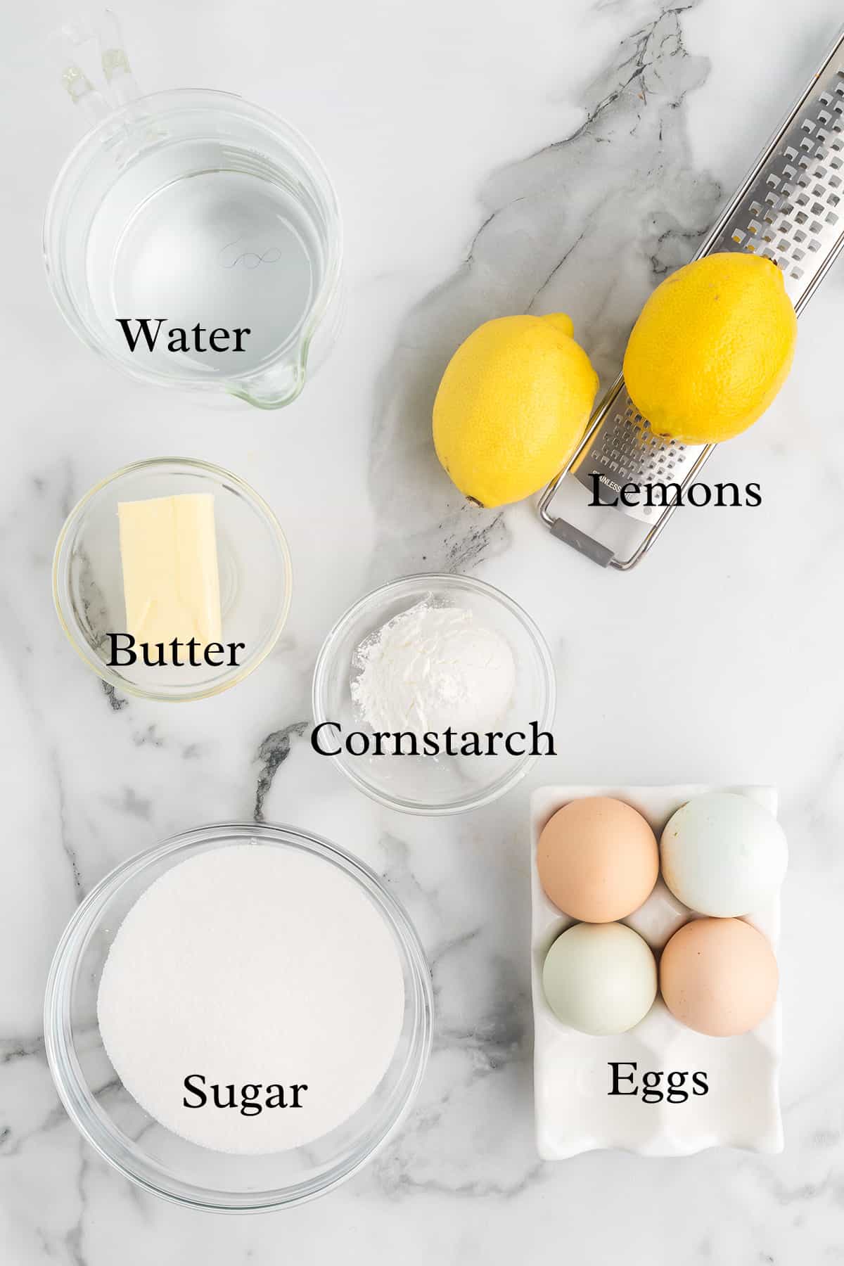 Ingredients needed to make lemon cheese.