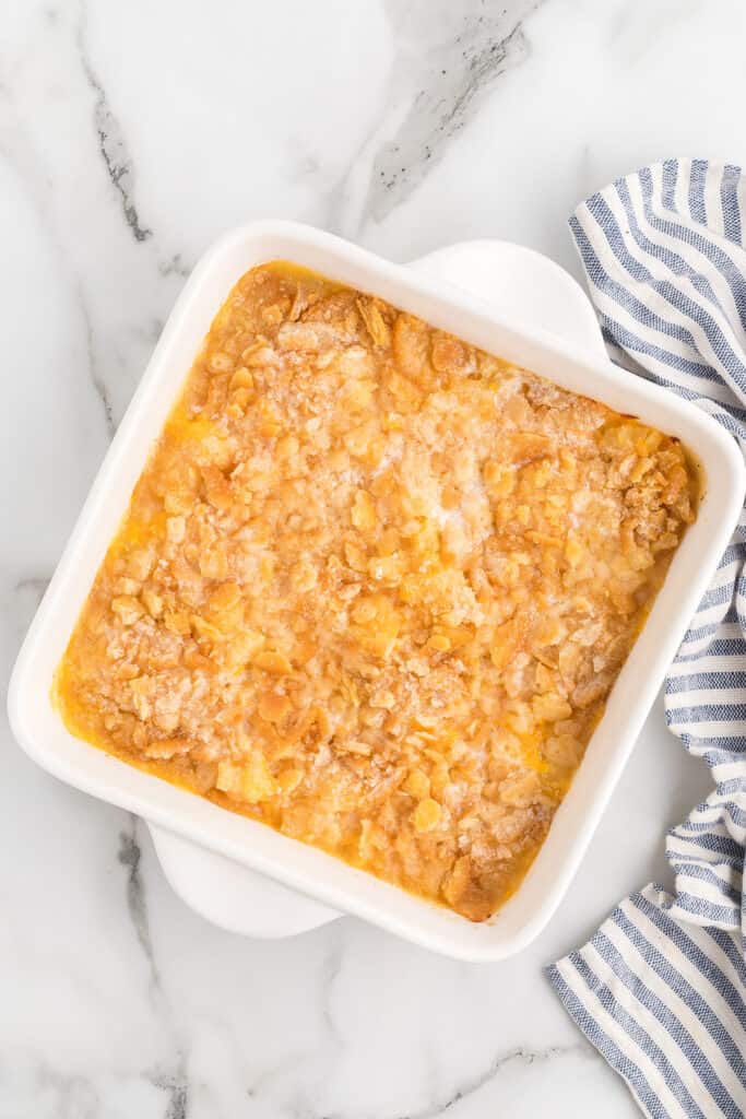 Baked casserole cooling in a baking dish.