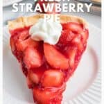 A slice of fresh strawberry pie with whipped cream on a white plate.