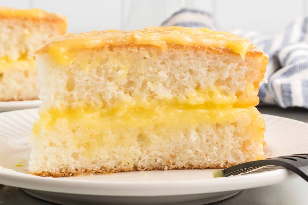A slice of lemon cheese cake.