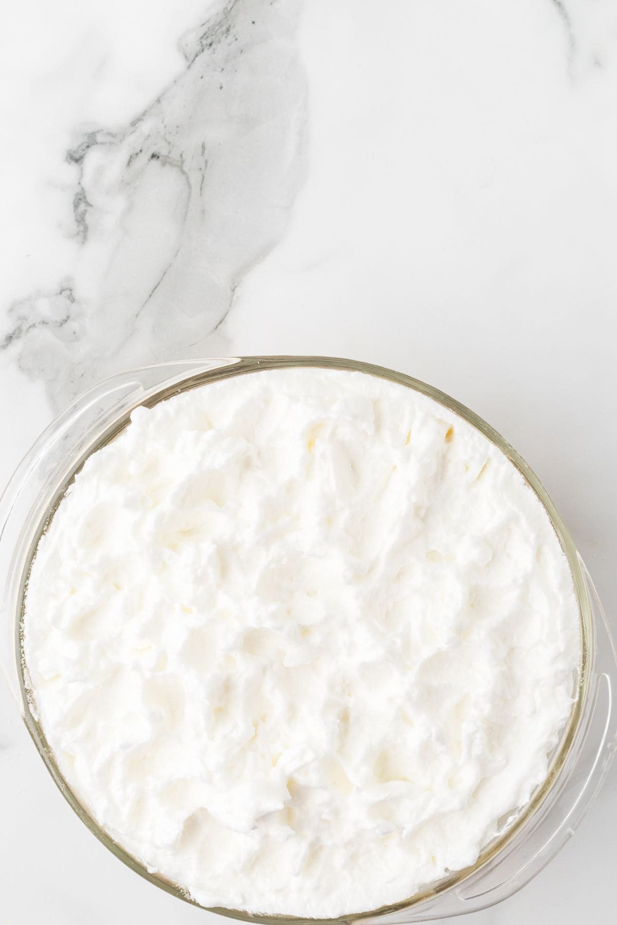 Meringue spread over the top of the pudding before being baked.