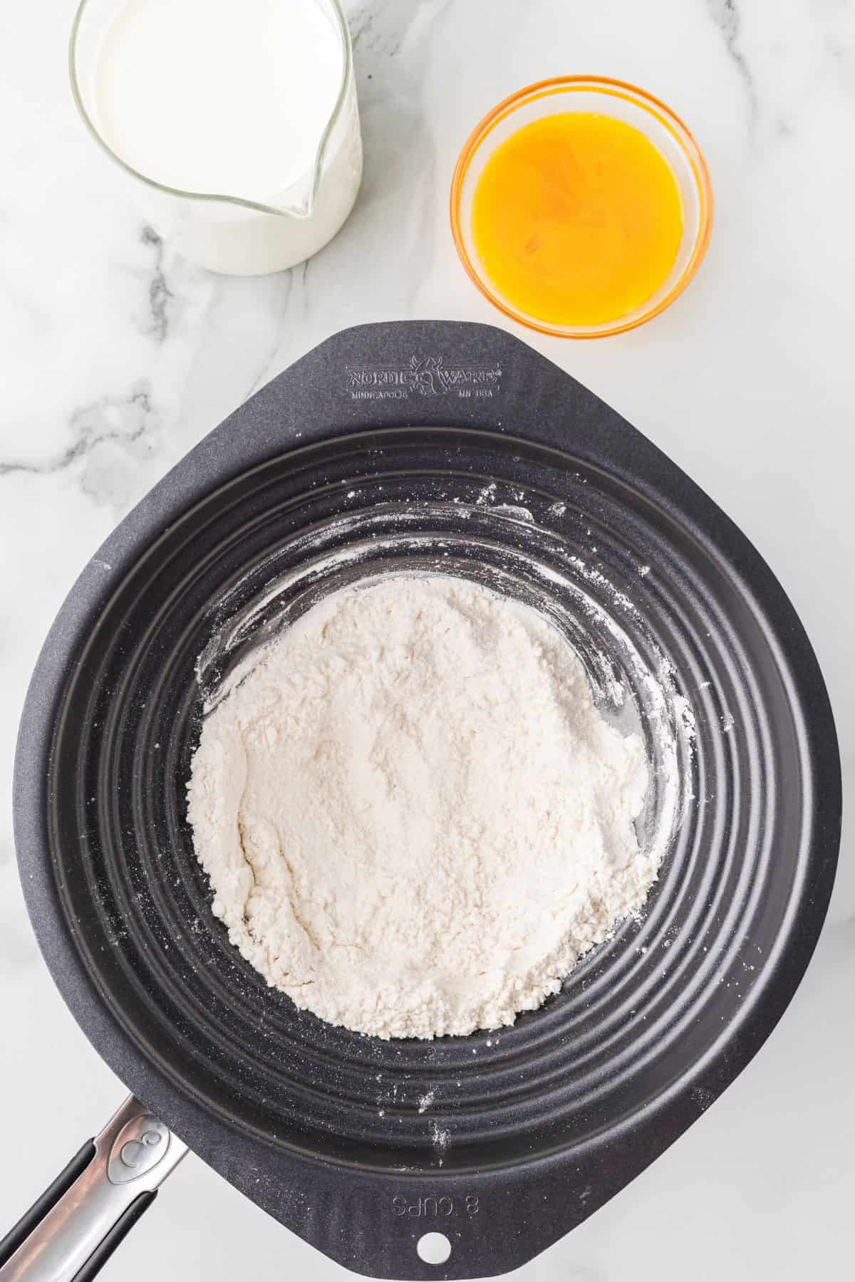 Flour sugar and salt mixed in a double boiler.