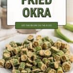 Finished fried okra on a white serving plate.