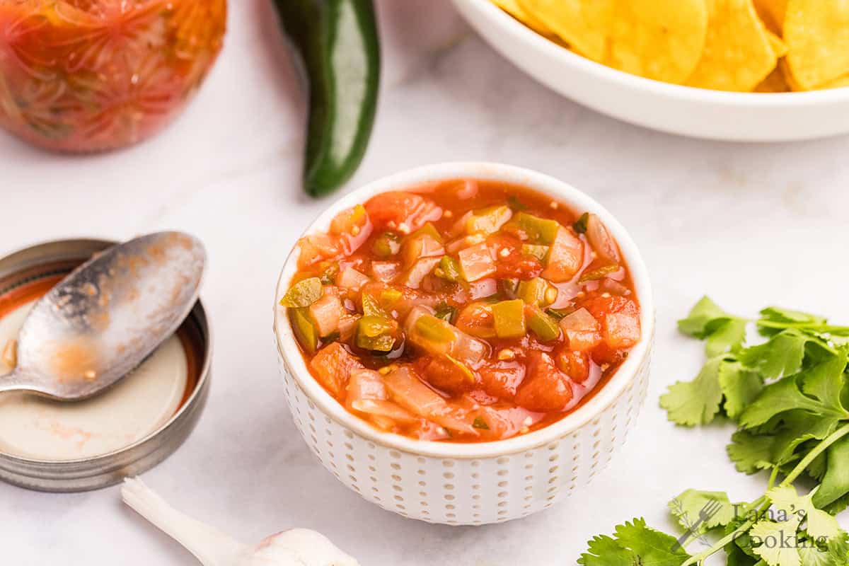 Salsa in a small white bowl.