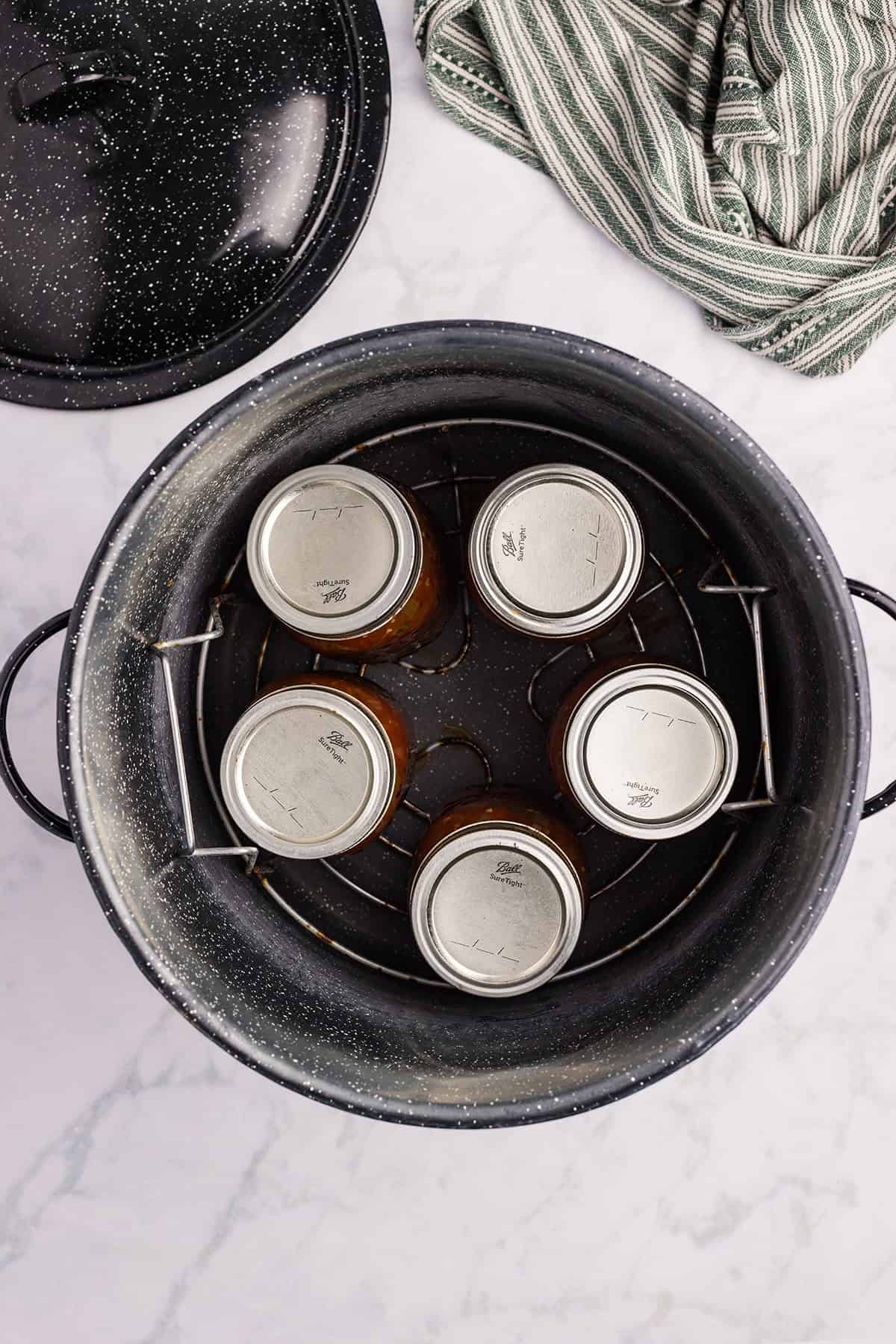 Jars placed into the canner.