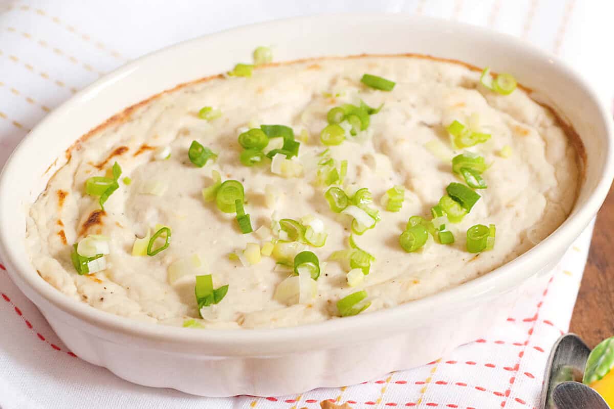 Baked crab dip in a small baking dish.
