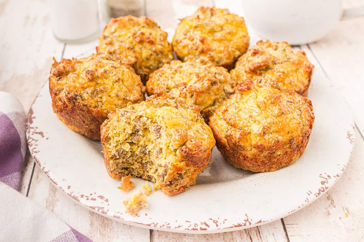 Finished muffins on a white plate.