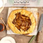 Baked pear galette on a wooden surface.