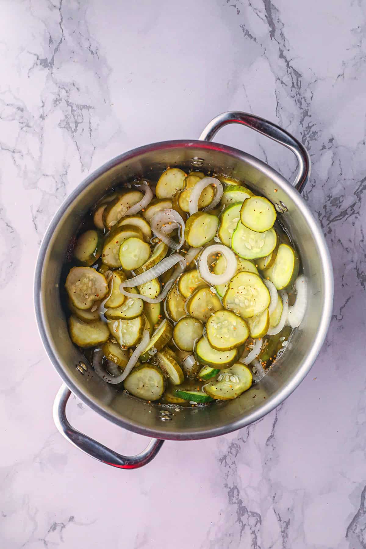 Vegetables added to pickling solution.