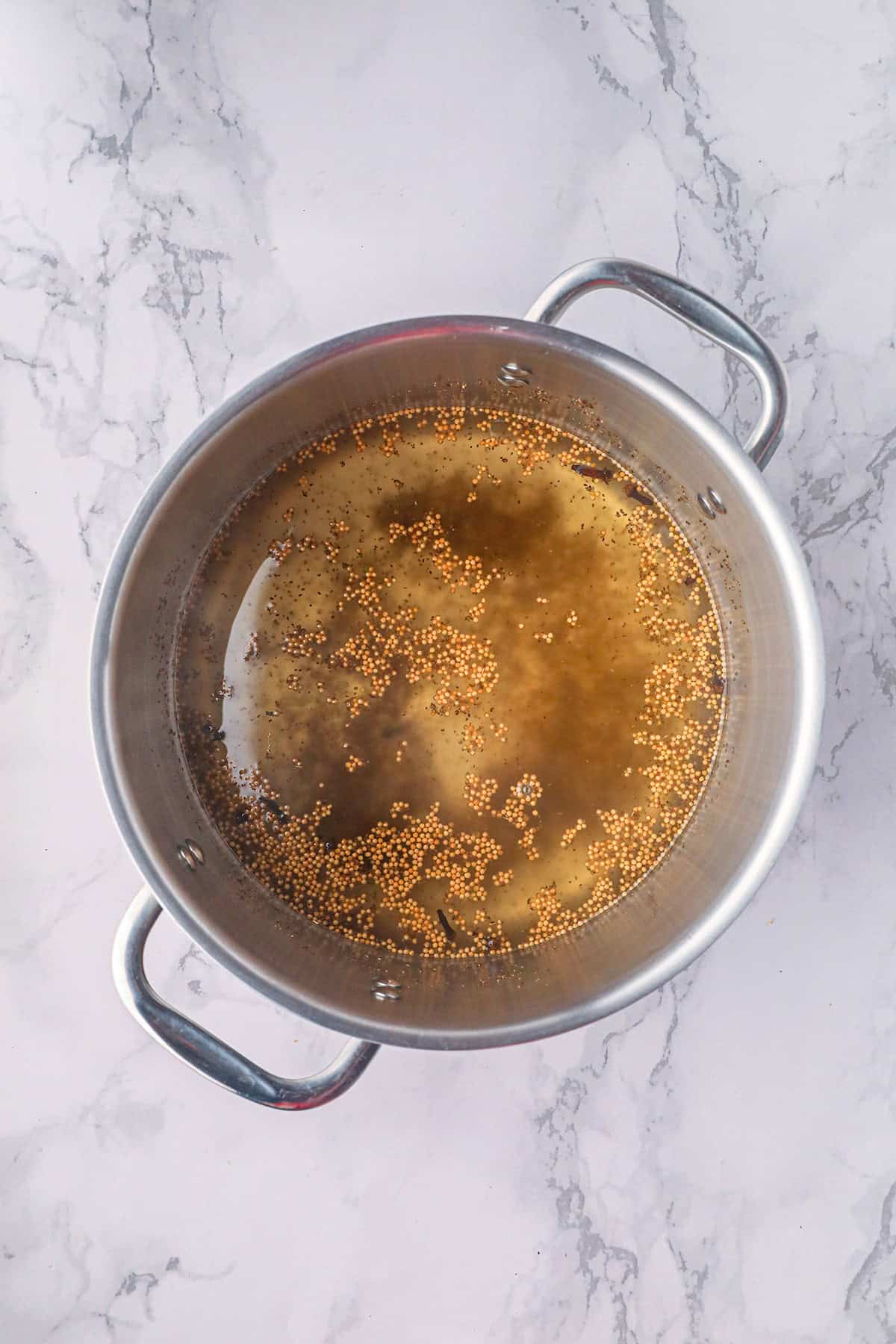 Pickling solution in a saucepan.