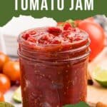Finished tomato jam in a glass jar.
