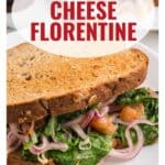 A grilled cheese Florentine sandwich with spinach, onions, and tomatoes on whole grain bread.