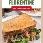 A grilled cheese Florentine sandwich with spinach and onions on whole wheat bread, served on a white plate.
