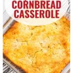 A baked squash and cornbread casserole in a glass dish, with text and a website link over the image.