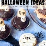 Chocolate cupcakes decorated with cookie tombstones and ghost shapes, and cookies topped with white frosting and candy eyes to resemble mummies, are displayed on a blue surface with plastic spiders. Text reads “Kid Friendly Halloween Ideas.”.