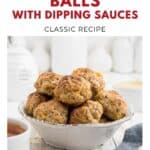 A bowl of sausage balls on a table, surrounded by small bowls of dipping sauces.