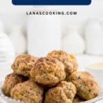 A bowl of sausage balls sits on a table with dipping sauces nearby and text about sausage ball recipes.