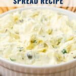 White bowl of creamy caraway cheese spread with herbs, surrounded by crackers. Text: Caraway Cheese Spread Recipe.