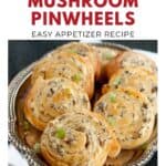 A plate of cheesy mushroom pinwheels garnished with chopped green onions.
