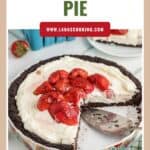 Cream cheese pie with Oreo crust, topped with sliced strawberries, partially sliced and served on a platter.