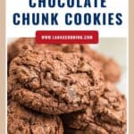 A stack of double chocolate chunk cookies on a light-colored surface, with text promoting the recipe.