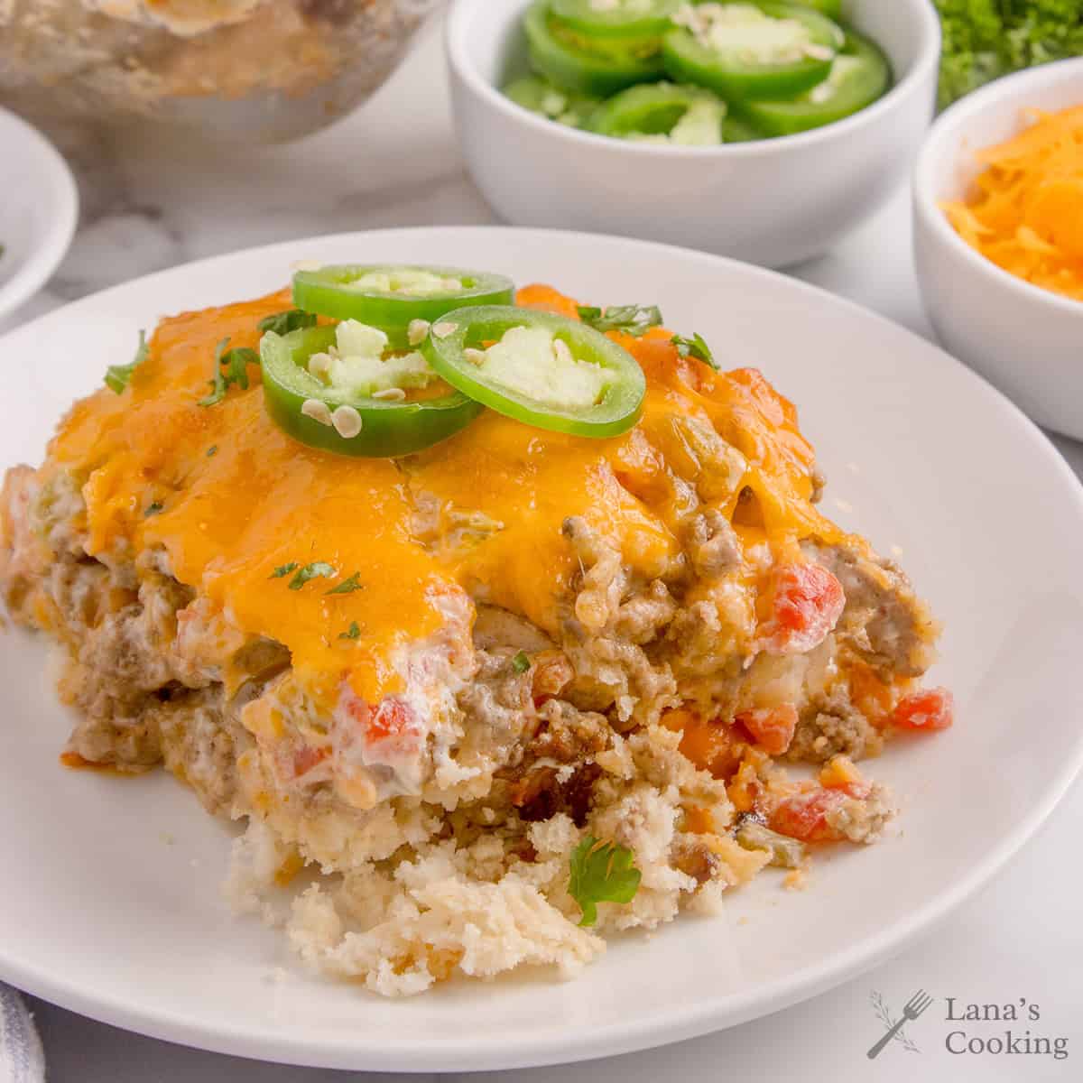 A serving of casserole on a white dish.