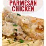 Close-up of baked parmesan chicken on pasta, topped with creamy sauce and parsley, with recipe website text.