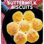 Seven golden biscuits in a cast iron skillet on a red checkered towel, text overlay reads recipe title.