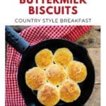 A skillet with seven golden buttermilk biscuits on a red cloth, labeled Old Fashioned Buttermilk Biscuits..