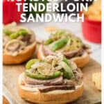Open-faced roasted pork sandwiches with onions and green peppers on buns, with chips on the side.