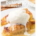 Apple dumplings topped with vanilla ice cream, melting slightly, served on a white plate.