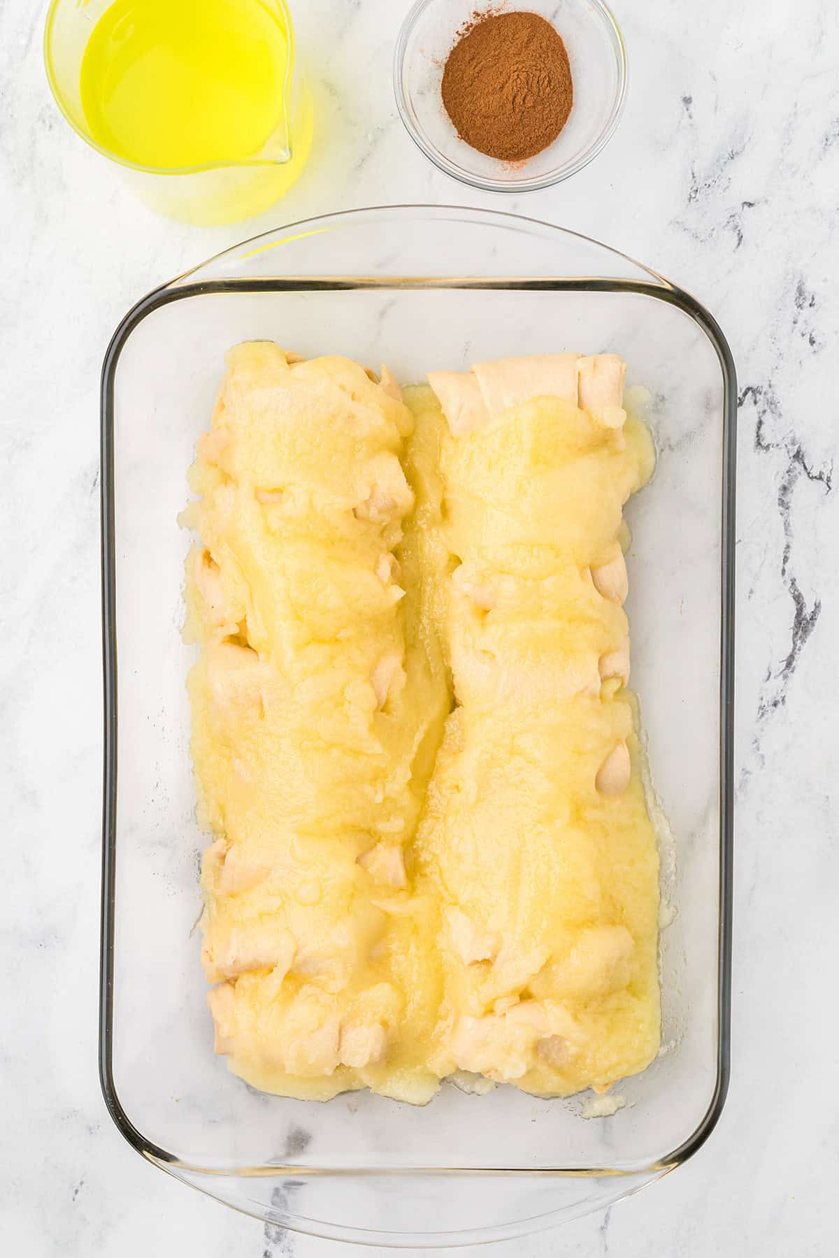 Butter and sugar mixture poured over top of the dumplings.
