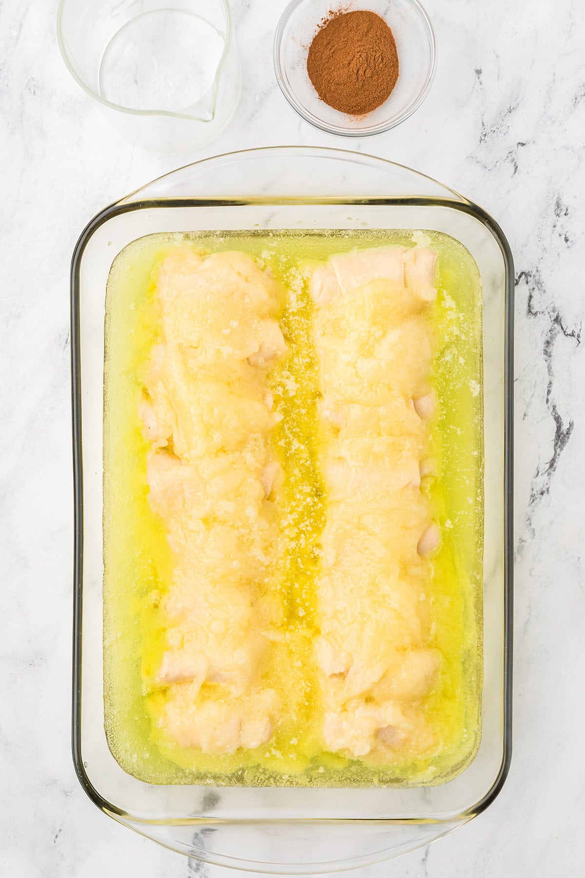 Mountain Dew added to the baking dish with dumplings.