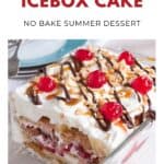 Banana split icebox cake topped with whipped cream, cherries, nuts, and chocolate drizzle in a glass dish.
