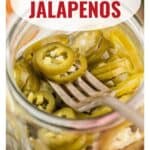 Sliced pickled jalapenos in a jar with a fork, text reads “Pickled Jalapenos” and a website URL below.