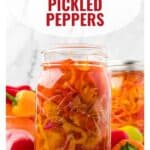 A jar of refrigerator pickled peppers with colorful peppers beside it and a label reading Refrigerator Pickled Peppers.