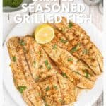 A plate of grilled fish fillets garnished with herbs and lemon, with text overlay about a grilled fish recipe.