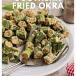A plate of golden-brown fried okra with a serving spatula on a white plate, labeled Southern Fried Okra.