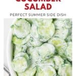 A bowl of creamy cucumber salad with dill, labeled as a perfect summer side dish.